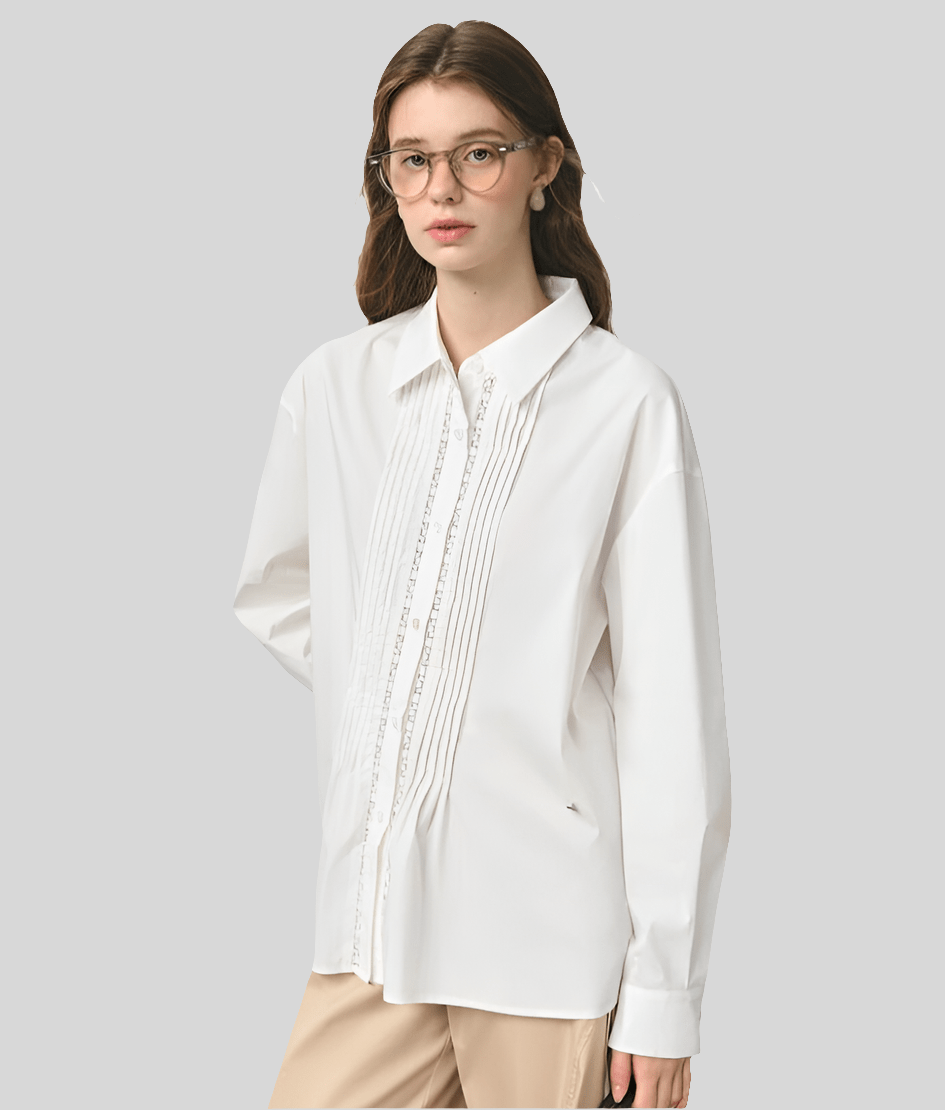 Blusa plisada de encaje otoño 2025