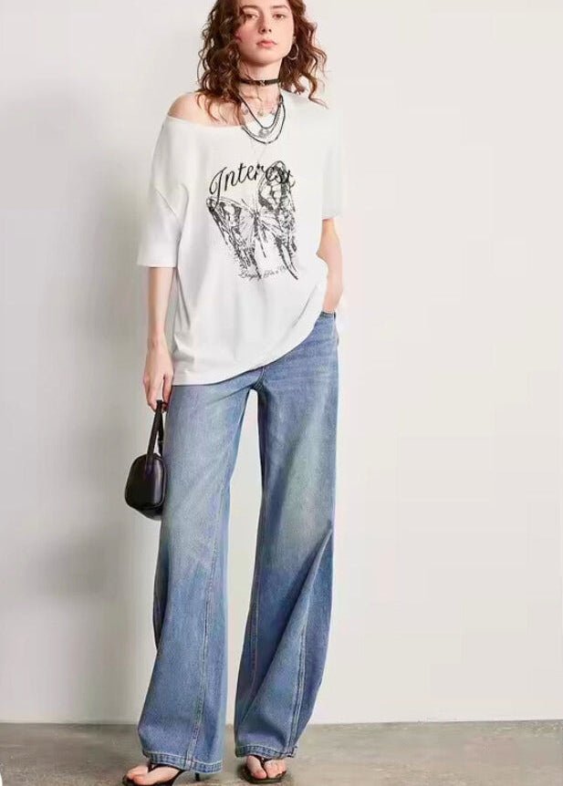 Blusa primavera 2026 con estampado de mariposas y hombros descubiertos