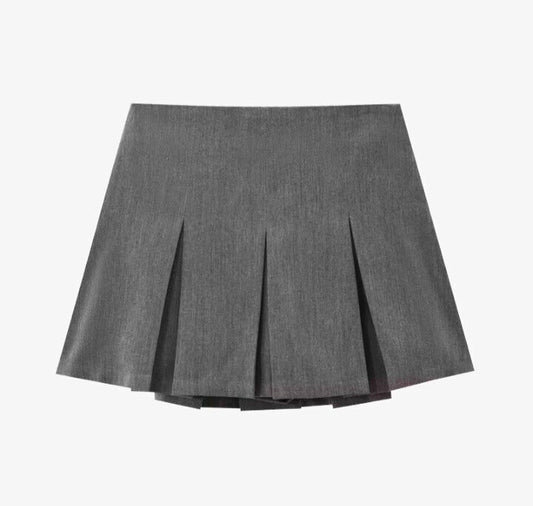 Faldas plisadas cortas: elegancia femenina. - MODA PAIXAO
