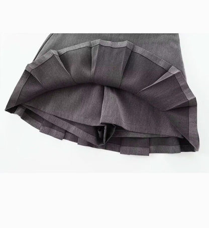 Faldas plisadas cortas: elegancia femenina. - MODA PAIXAO